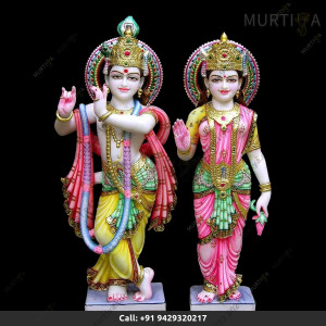 Painted Marble Radha Krishna ji with peacock Dark Colored Lotus in Hand | Custom Marble Deity Maker Painted Marble Radha Krishna ji with peacock Dark Colored Lotus in Hand | Custom Marble Deity Maker