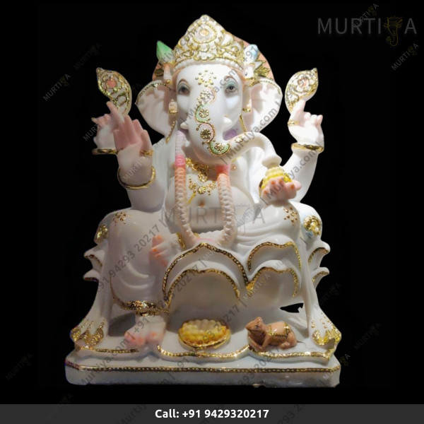 Marble Ganesh ji with On Lotus With Light Golden Outline Marble Ganesh ji with On Lotus With Light Golden Outline